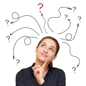 Business Woman With Arrows And Questions Sign Above Isolated On